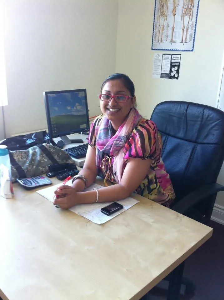 Jasraj smiling at her instructor's desk