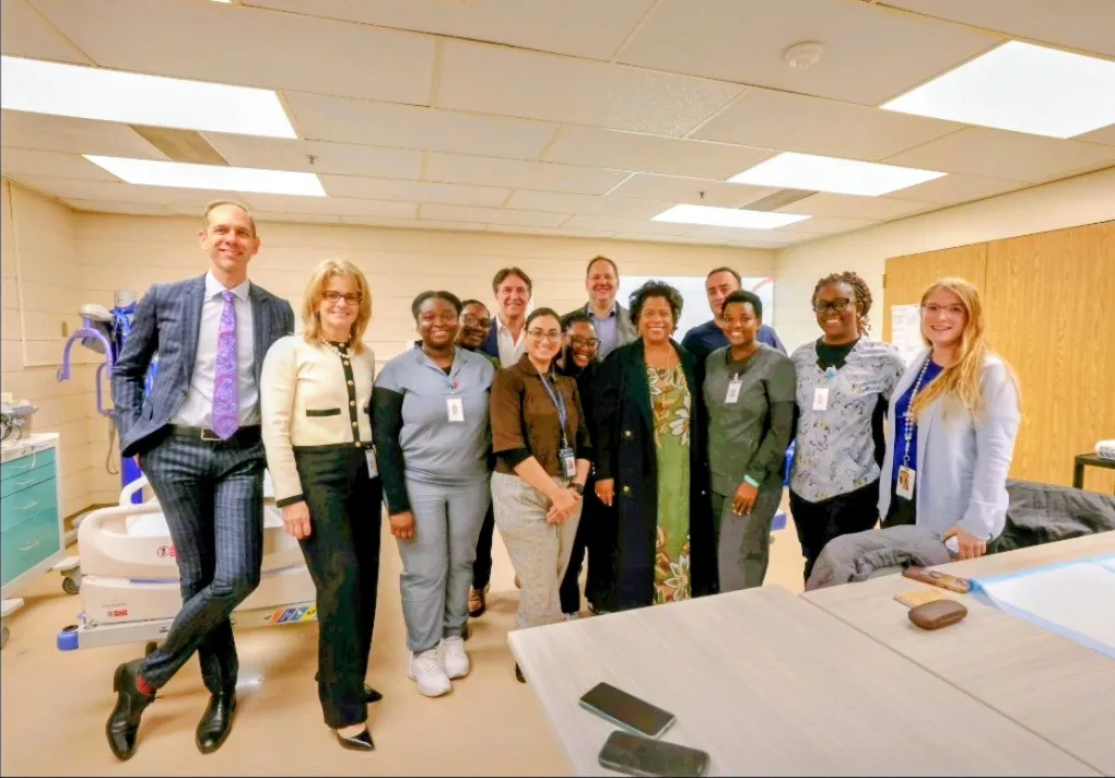 Jasraj with hospital leaders and nursing staff during a unit visit